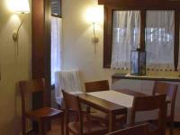 a dining room with a table and chairs at El Valle Hotel Rural in Sotillo del Rincón