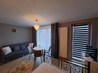 Posedenie v ubytovaní Apartament Kryształowy