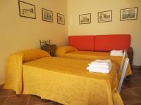 Posteľ alebo postele v izbe v ubytovaní La Carretteria Guest house