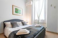 Posteľ alebo postele v izbe v ubytovaní Deluxe studio Milano