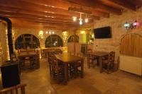 Euphoria Cave Houseにあるテレビまたはエンターテインメントセンター