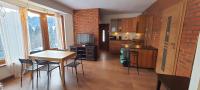 Kuchyňa alebo kuchynka v ubytovaní Apartamenty na Poludniowym Stoku