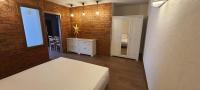 Posteľ alebo postele v izbe v ubytovaní Apartamenty na Poludniowym Stoku