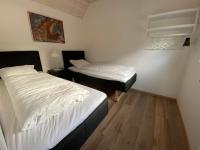 Esehytter Luxury Holiday Home near Beachにあるベッド