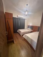 Postel nebo postele na pokoji v ubytování Mov’in stays