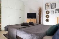 Posteľ alebo postele v izbe v ubytovaní Evaggelia's Apartments 2 Διαμονή σαν το σπίτι σας