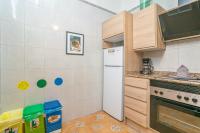 A kitchen or kitchenette at Sabatera