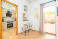 A kitchen or kitchenette at Sabatera