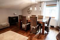 a dining room with a table and chairs at Appartement Mountainrelax Gastein in Dorfgastein