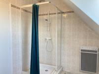a shower with a glass door in a bathroom at LE COQ - Maison 10 personnes - Locmariaquer in Locmariaquer
