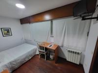 Posteľ alebo postele v izbe v ubytovaní Hostal La Frontera
