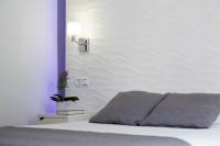 Posteľ alebo postele v izbe v ubytovaní Hostal Alhambra - Adults Only