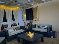 Posezení v ubytování TaliaKà B & B