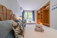 Postel nebo postele na pokoji v ubytování MEDANO4YOU Ixchel Beach House