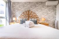 Postel nebo postele na pokoji v ubytování MEDANO4YOU Ixchel Beach House