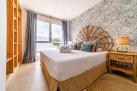 Postel nebo postele na pokoji v ubytování MEDANO4YOU Ixchel Beach House