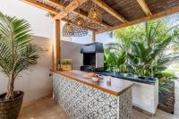 Kuchyň nebo kuchyňský kout v ubytování MEDANO4YOU Ixchel Beach House