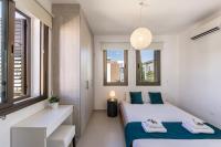 Postel nebo postele na pokoji v ubytování Accomoteleia Blue Villa