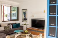 TV a/nebo společenská místnost v ubytování Accomoteleia Blue Villa