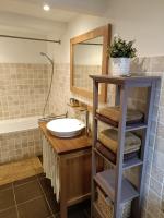 a bathroom with a sink and a mirror at Lovely cottage in Honfleur center in Honfleur