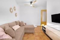 Televízia a/alebo spoločenská miestnosť v ubytovaní Apartamento con PISCINA ideal FAMILIAS