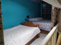 Łóżko lub łóżka w pokoju w obiekcie Villa Patio Capbreton