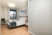 Postel nebo postele na pokoji v ubytování Trisquel, apartamento con piscina en Llanes VUT-3108-AS