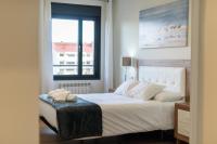 Postel nebo postele na pokoji v ubytování Trisquel, apartamento con piscina en Llanes VUT-3108-AS
