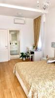 A bed or beds in a room at Casa di Taty B&B