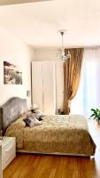 A bed or beds in a room at Casa di Taty B&B
