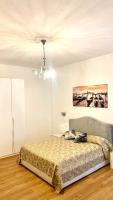 A bed or beds in a room at Casa di Taty B&B