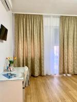 A television and/or entertainment centre at Casa di Taty B&B