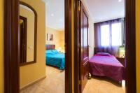 Postel nebo postele na pokoji v ubytování Boutique Apartment Love You