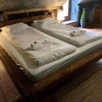 Posteľ alebo postele v izbe v ubytovaní Excalibur miniHotel