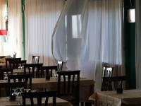 En restaurant eller et andet spisested på Hotel Resort Poggio degli Ulivi