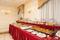 a buffet line with many different types of food at Hotel A La Commedia in Venice