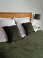 Posteľ alebo postele v izbe v ubytovaní Gîte cosy en forêt