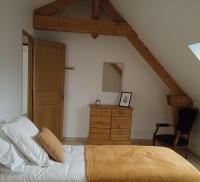 Posteľ alebo postele v izbe v ubytovaní Gîte cosy en forêt