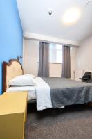 Hotel Derby MERODEにあるベッド