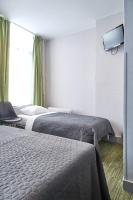Hotel Derby MERODEにあるベッド