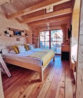 Postel nebo postele na pokoji v ubytování Ribno Luxury Glamping