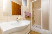 Kúpeľňa v ubytovaní Apartments Sinisa