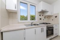 Kuchyňa alebo kuchynka v ubytovaní Apartments Sinisa