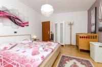 Posteľ alebo postele v izbe v ubytovaní Apartments Sinisa