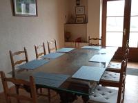 a dining room with a table and chairs and a window at Gîte Arthon, 5 pièces, 8 personnes - FR-1-591-372 in Arthon