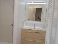 a bathroom with a sink and a mirror at Gîte Arthon, 5 pièces, 8 personnes - FR-1-591-372 in Arthon