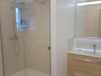 a bathroom with a glass shower and a sink at Gîte Arthon, 5 pièces, 8 personnes - FR-1-591-372 in Arthon