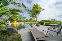 a backyard with a pond with a rubber duck in it at Yun Tien Feng Chuan B&amp;B in Dongshan