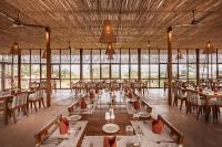 En restaurant eller et andet spisested på Sanctuary Chitwan National Park