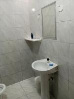 Koupelna v ubytování Quarto próximo ao shopping Moinhos